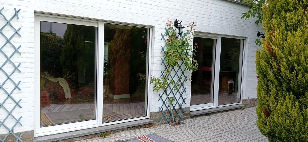 Remplacement de châssis et grande baie coulissante en rénovation — réalisation Pulsar Windows