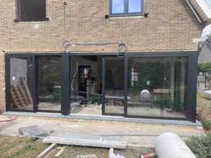 11PREMIDOOR 76 (COULISSANTE PVC KÖMMERLING)